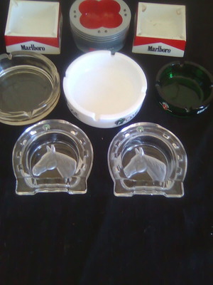Ashtrays set of 8 like new