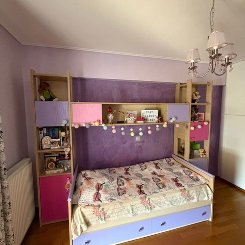 Children's bedroom set like new with bed, bookshelf, desk, and storage unit