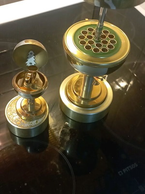 Vintage cigarette dispensers used with lighter and music box