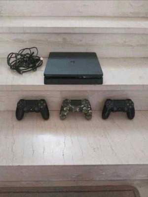 PlayStation 4 Slim 1TB with 3 DualShock 4 Controllers like new