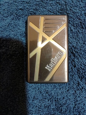 Marlboro metal collectible lighter used, non-functional