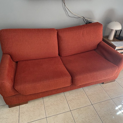 Orange sofa like new, comfortable and soft
