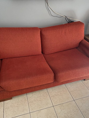 Orange sofa like new, comfortable and soft