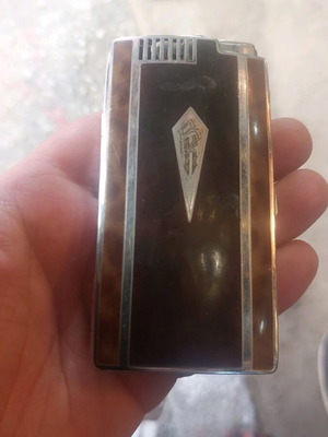 Ronson lighter with tortoise and cigarette case used