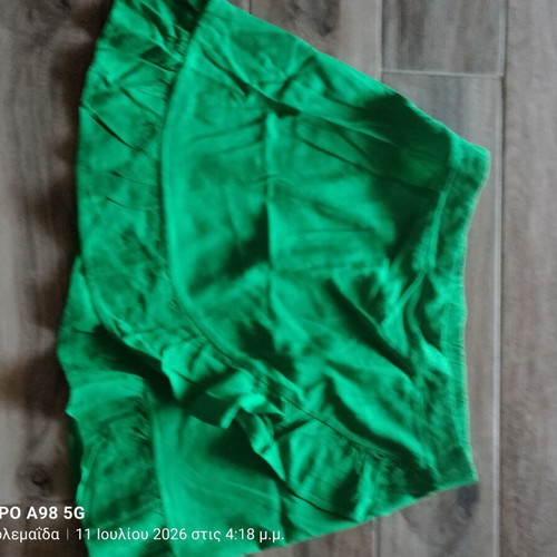 Anel green short skirt like new with ruffles, size L 40 12