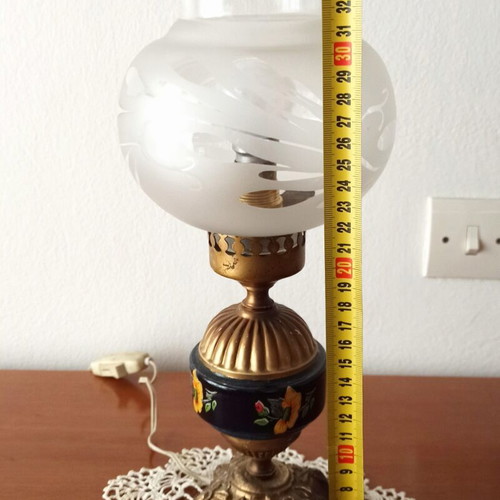 Vintage table lamp with glass shade and decorative metal base used