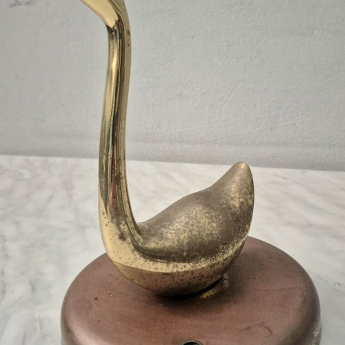 Decorative brass duck on iron base used