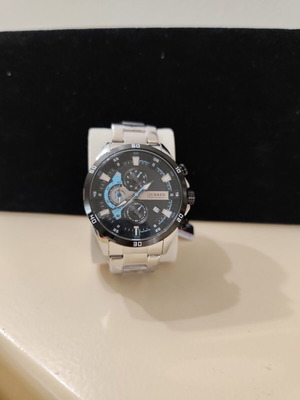 Curren men's watch like new with stainless steel bracelet and black-blue dial