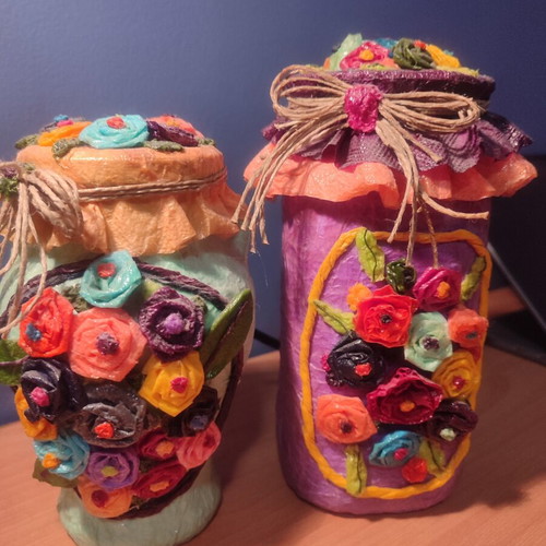 Set of 2 handmade decorative vases with embossed flowers