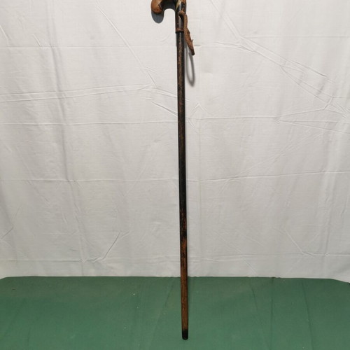 Wooden walking stick used, brown shade with wear