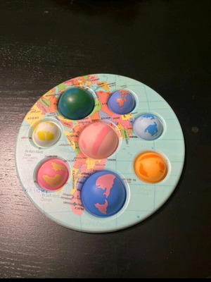 Pop it stress relief toy with planets like new