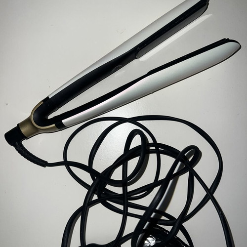 GHD Platinum+ hair straightener used for parts or repair