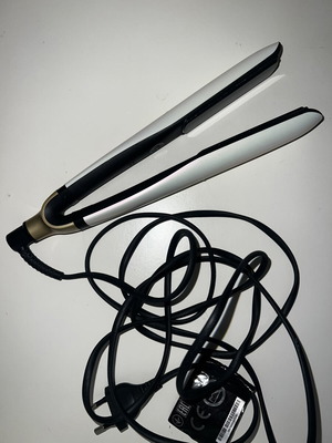 GHD Platinum+ hair straightener used for parts or repair