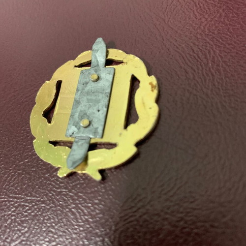 Military hat emblem used, authentic from the 80s