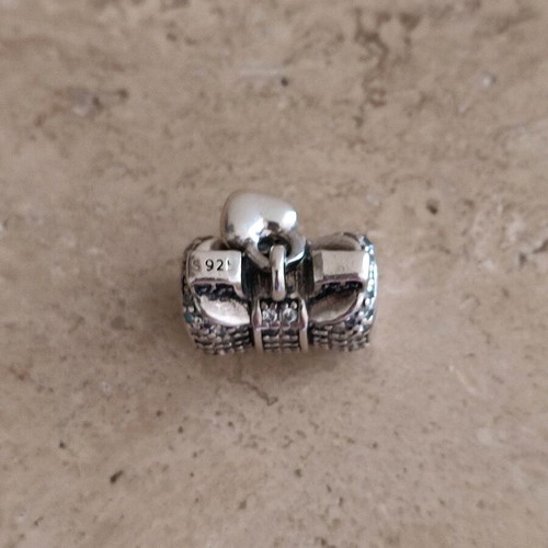 Pandora charm silver 925 like new with bow and heart zirconia