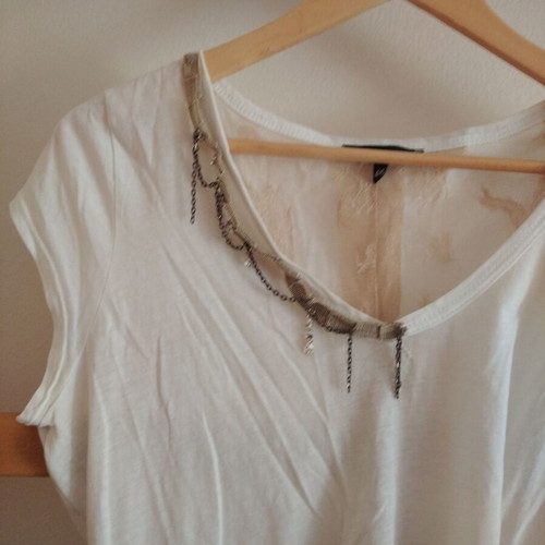 White blouse with lace back and decorative chain, size M