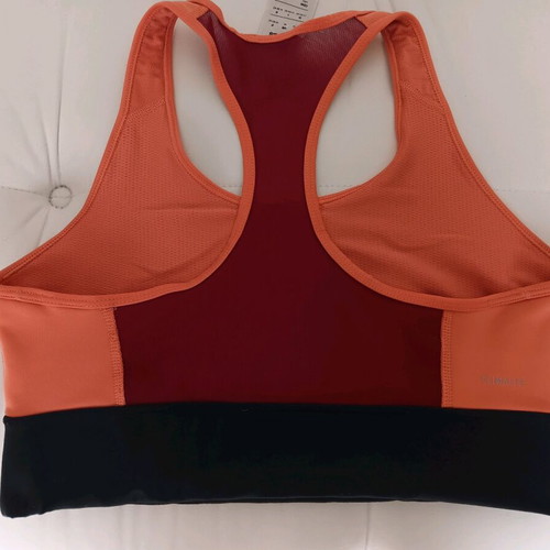 Adidas sports bra used, orange, size M