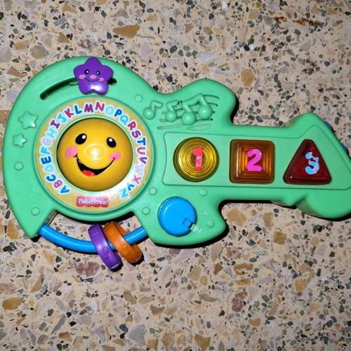 Fisher Price musical guitar used with English songs