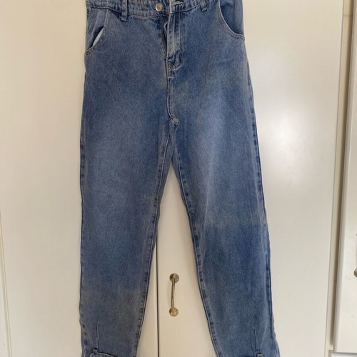 Denim jeans new with adjustable elastic, sizes S and M