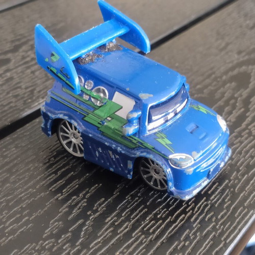 Disney Cars DJ 1:55 scale used, moderate condition with glued spoiler