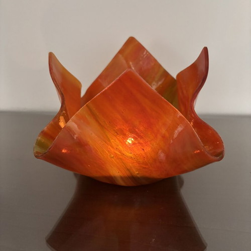 Handmade glass candlestick in red, orange and yellow shades