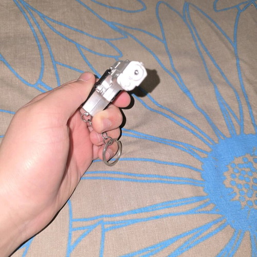 Lazer flashlight keychain in gun shape like new