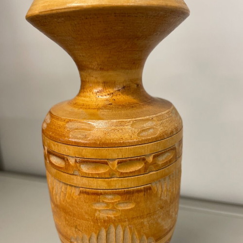 Wooden vase made of beech with traditional carved geometric patterns