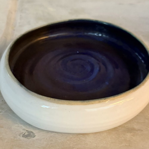 Handmade ceramic bowl new, white exterior and indigo interior