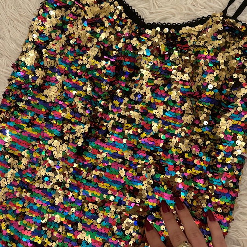 Elastic festive blouse with colorful sequins like new