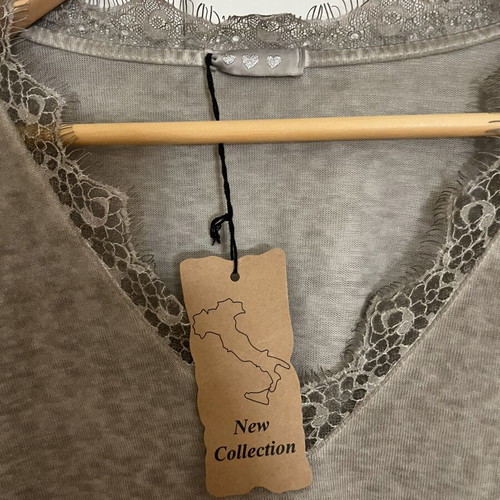 Women's blouse with lace details on V and sleeves, grey beige