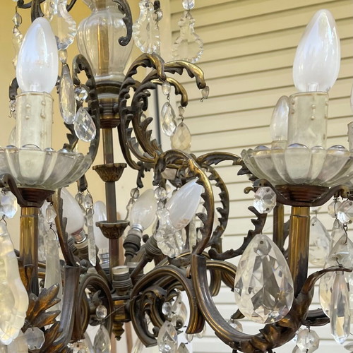 Antique chandelier used with bronze and crystal