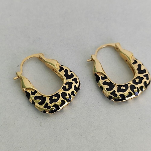 Hoop earrings with animal print detail in black enamel like new