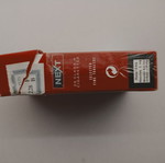 Empty hard pack of NEXT cigarettes used