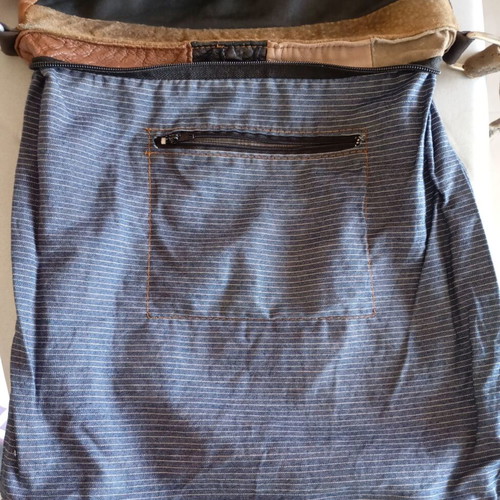 Crossbody bag made of suede used with signs of wear