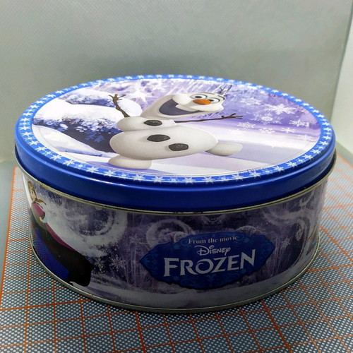 Metal round Frozen tin with Olaf Disney store used