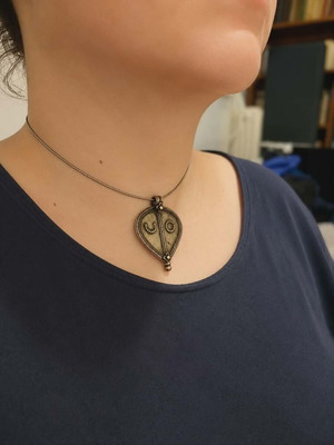 Vintage necklace with 925 silver chain and large ethnic pendant used