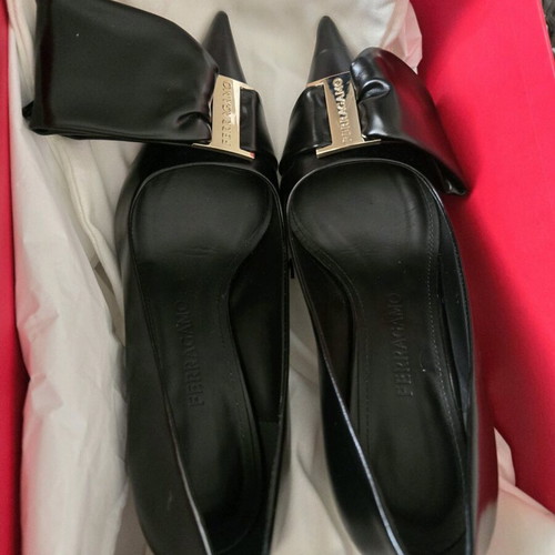 Salvatore Ferragamo leather pumps like new with unique design, size 37, black