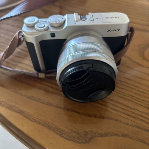 Fujifilm X-A7 mirrorless camera with XC15-45mm lens and accessories