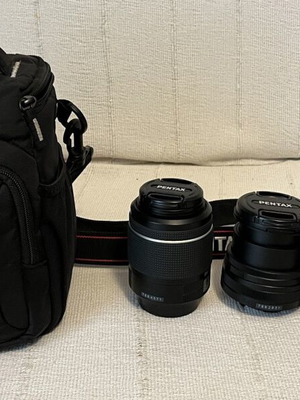 Pentax K-70 SLR digital camera with two lenses and accessories