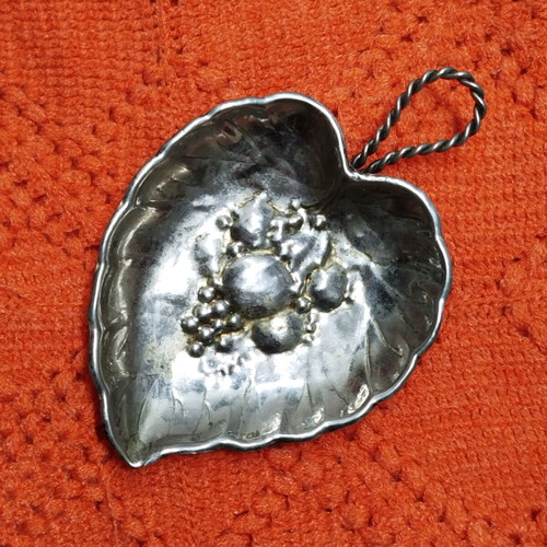 Vintage silver plated leaf-shaped plate used with embossed design