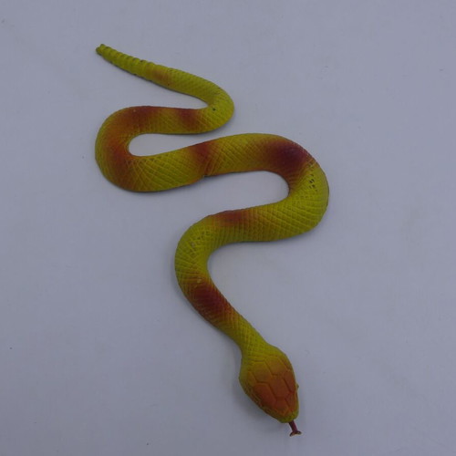 Plastic animal toys used, yellow snake