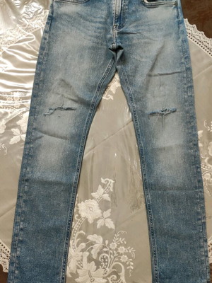 Lee Jeans pants used with knee rips, size M