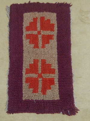 Wool woven rug used from the 1950s with traditional design