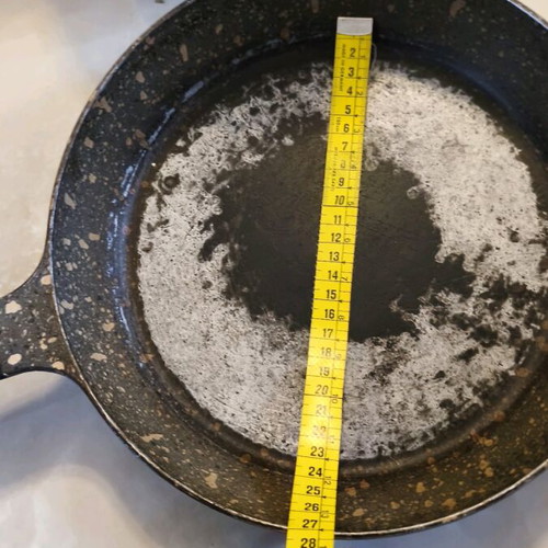 Heavy cookware set used with lids and large frying pan