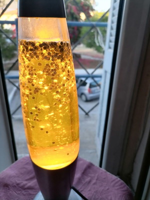 Led lava lamp yellow with silver effect, like new
