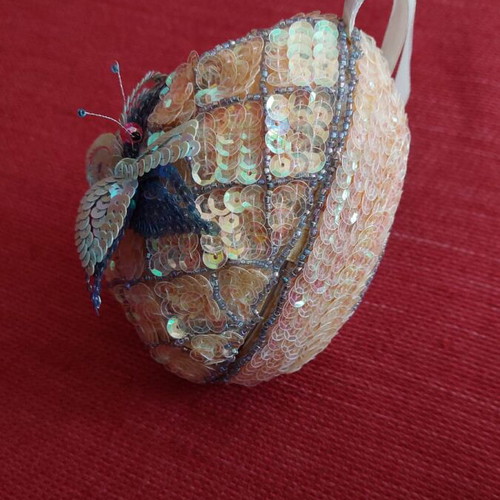 Handmade decorative egg like new with sequin embroidery and butterfly