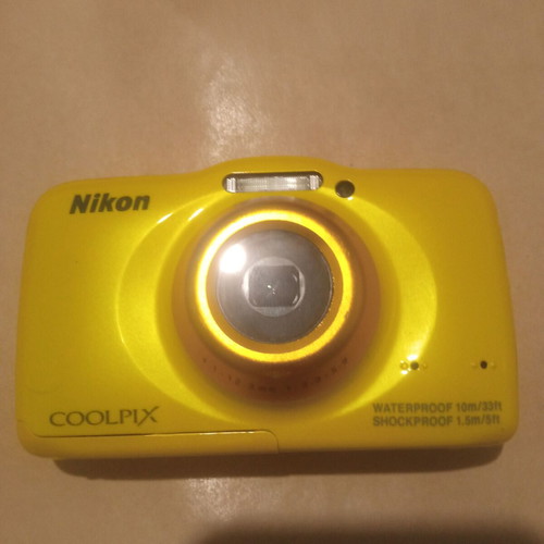 Nikon COOLPIX S32 camera for repair or parts, used
