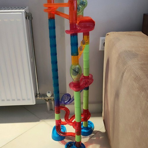Marble run toy used, assembly game with 10 marbles