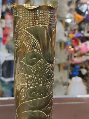 Vase from old shell used, bronze