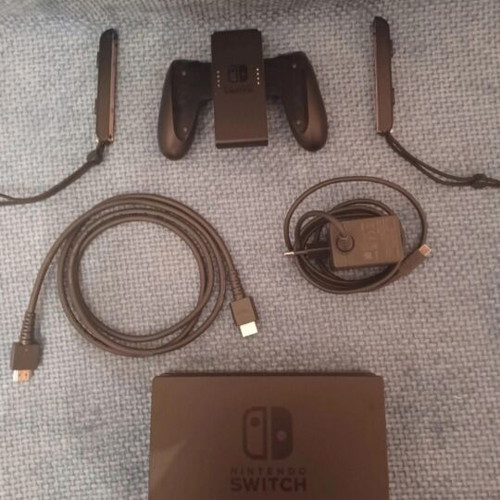 Nintendo Switch console with controller, Mario Kart Deluxe 8 code